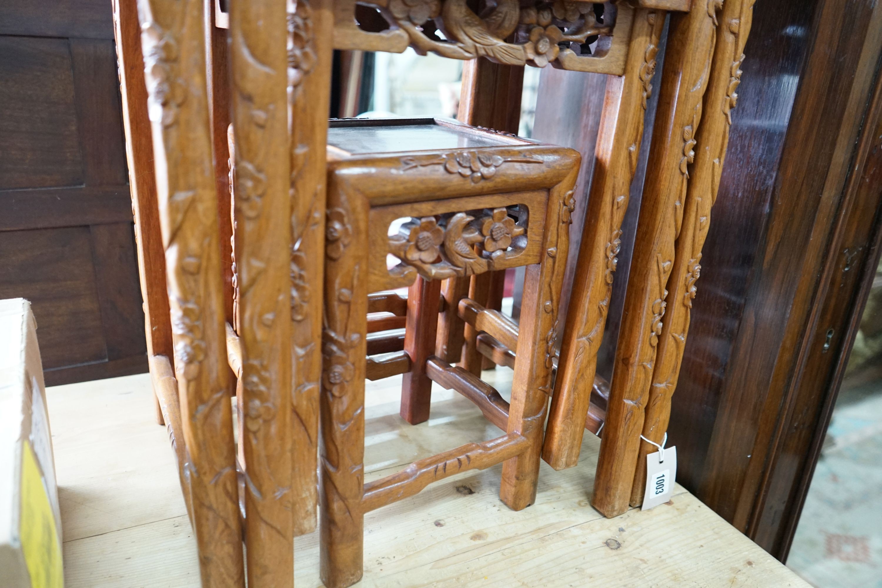 A quartetto of Chinese carved hardwood tea tables, width 46cm, depth 36cm, height 68cm